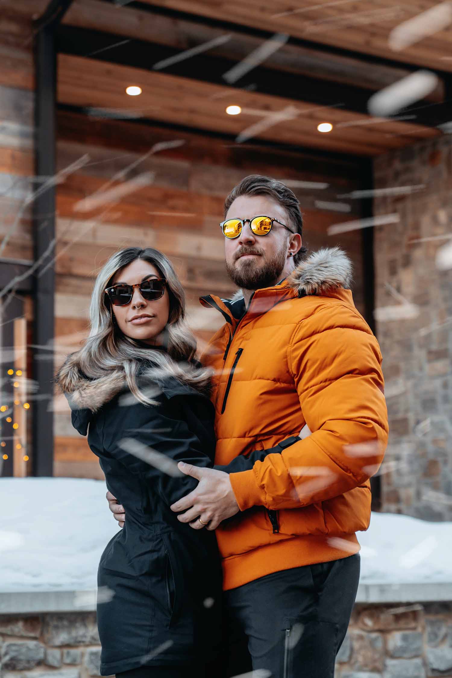 a person and person standing in snow